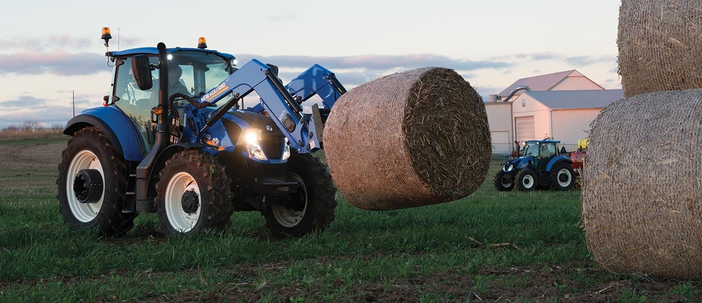 New Holland Tractor Moving Hay