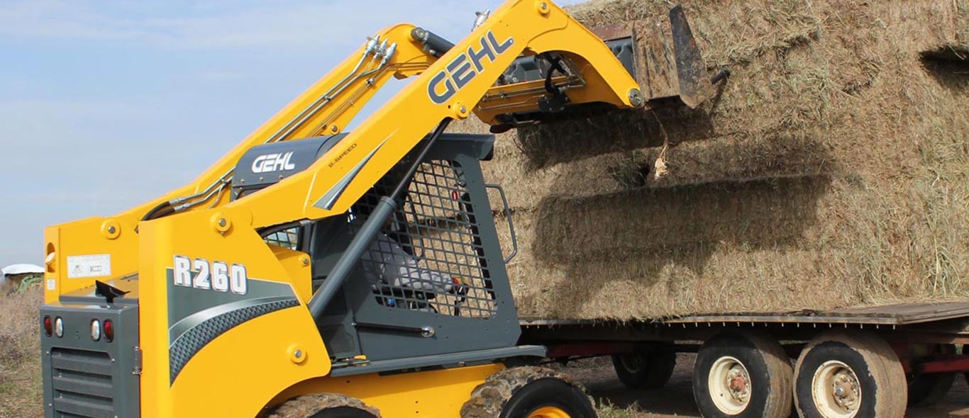 Gehl Skid Steer Moving Hay
